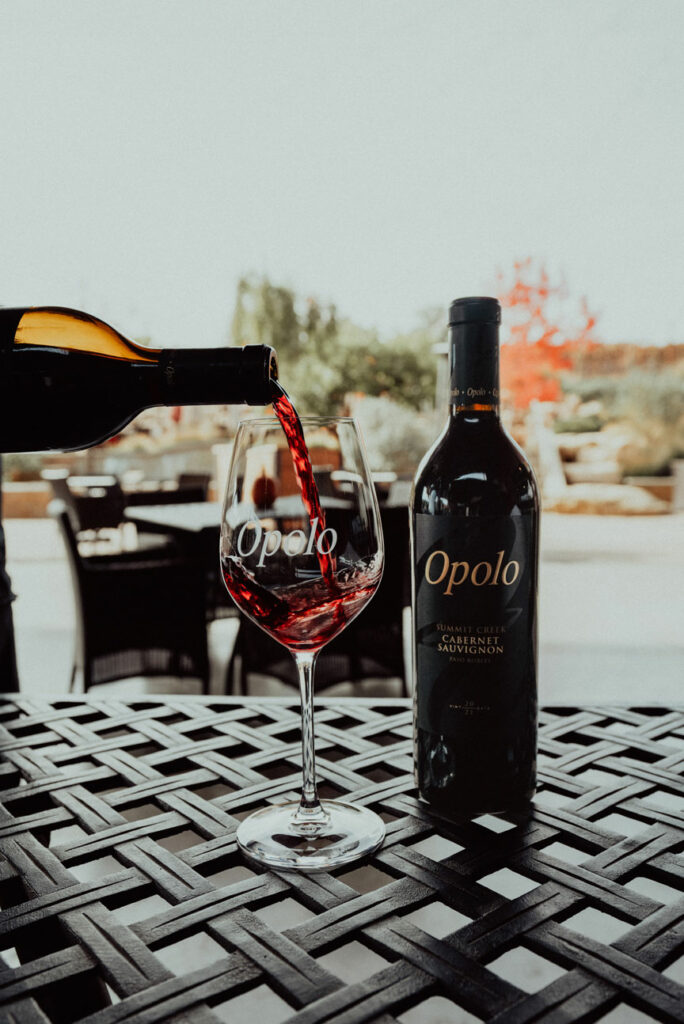 Bottle of Opolo Summit Creek Zinfandel being poured into a glass